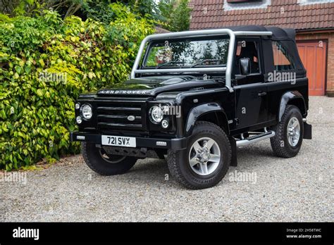 Land Rover Defender Svx Special Edition Parked On A Gravel Drive In