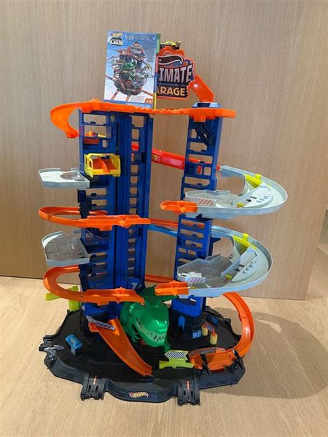 Hot Wheels Mega Garage mit T Rex D occasion à Kilchberg ZH pour CHF retrait uniquement
