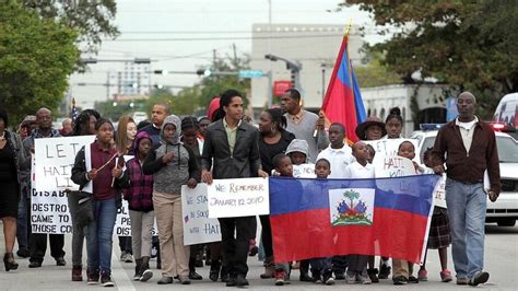 Dozens Pay Tribute To Victims On Sixth Anniversary Of Haitian