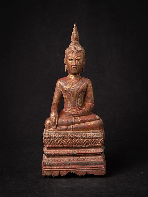 Antique wooden Thai Buddha statue from Thailand