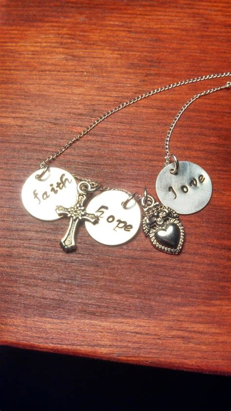 Hand stamped faith hope love necklace by ByalittlebitofFaith