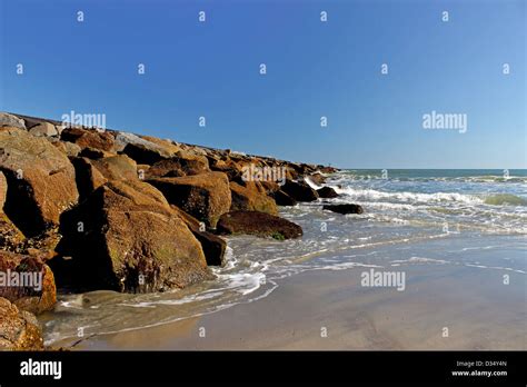 Along Rock Jetty Reaches Out Into The Atlantic Stock Photo Alamy