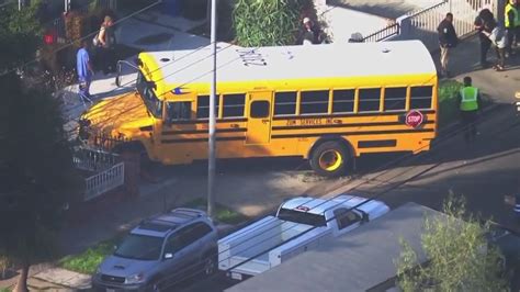 School bus crashes into parked cars, fence in South LA | FOX 11 Los Angeles