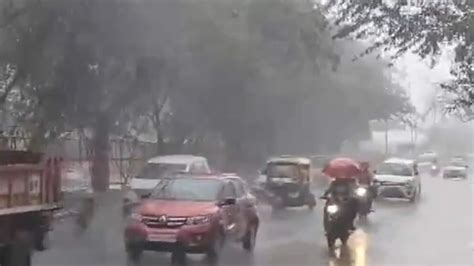 Heavy Rain Lashes Delhi Ncr Brings Respite From Heat