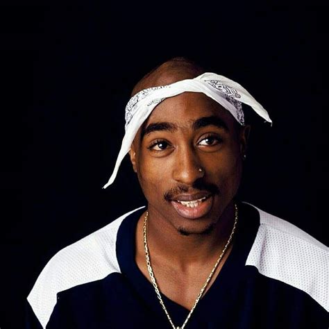 Tupac Holding A Gun