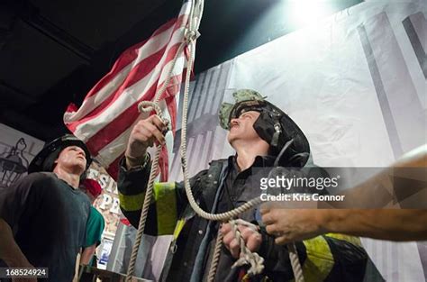 Raising The Flag At Ground Zero Photos And Premium High Res Pictures