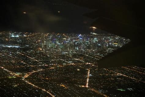 Night Aerial View of Melbourne Skyline from a Landing Airplane ...