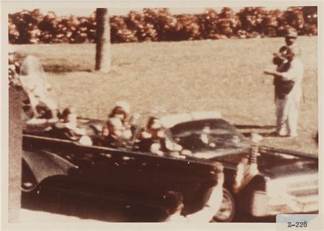 A Series Of 36 Film Stills And 40 Color Slides From The Zapruder Film Of President Kennedys