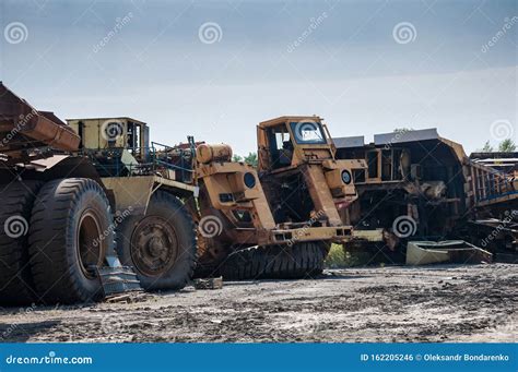 Scrap Metal Of Open Cast Mine Heavy Dump Trucks Royalty Free Stock