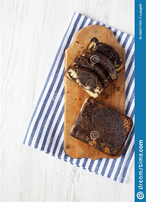 Homemade Chocolate And Vanilla Marble Cake On A Rustic Wooden Board Top View Copy Space Stock