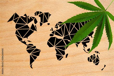 Marijuana And Wooden World Map Black Cubist Continents from Top Right Stock Photo | Adobe Stock