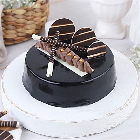 Buy Send Dark Chocolate Truffle Eggless Cake Half Kg Online Fnp