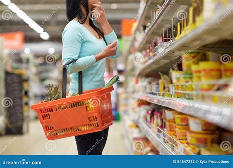 Woman With Food Basket At Grocery Or Supermarket Stock Photo Image Of