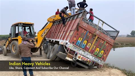 Tata 4823 Signa 16 Chakka Truck Stuck In Risky Situation Rescued By Jcb