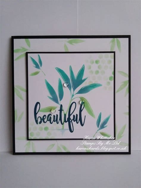 a card with the words beautiful written on it and some green leaves in ...