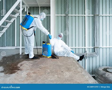 Specialist Worker Rest And Sitting After Used Spray Sanitizer For