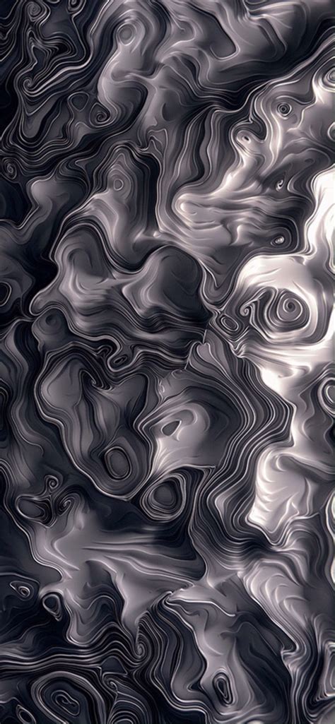 An Abstract Background With Black And White Swirls