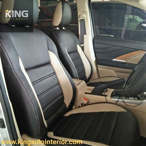 The Interior Of A Car With Black Leather Seats