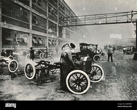 Workers Testing The Cars Engine At The Ford Motor Company Headquarters