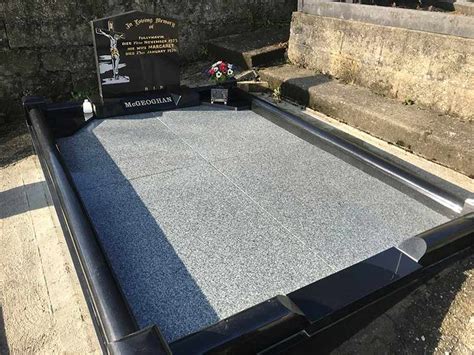 Black granite headstone with kerbset - North West Memorials