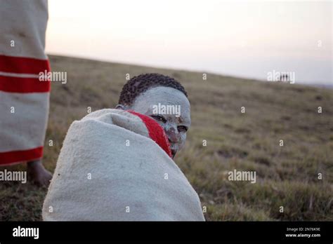 A Xhosa Boy Covered With A Blanket Take Part In A Traditional Xhosa