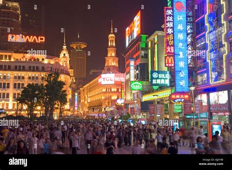 Nanjing Road at night Shanghai s busy commercial street Nanjing Road ablaze with neon signs at ...