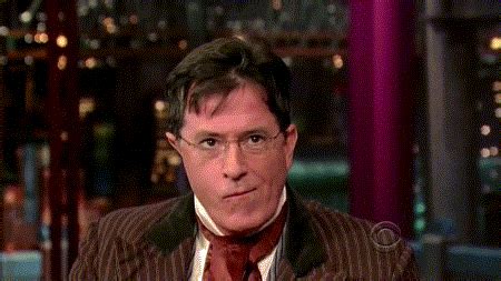 Stephen Colbert plays with his pointed ear : gifs