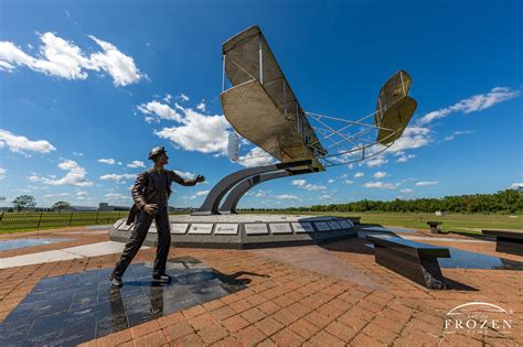 Fair Day Over Wright Flyer Sculpture No Art Of Frozen Time