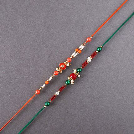 Online Sneh Green Pearl Rakhi Set With Kaju Katli Gift Delivery In UAE