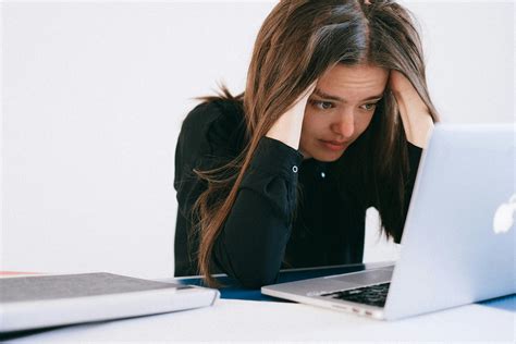 Stressed Woman Looking at a LaptopFree Stock Photo