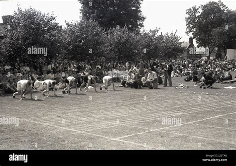 1950s Historical Sprinters About To Start A Race At The