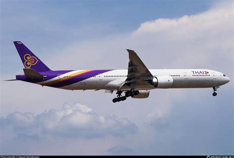 HS TKL Thai Airways International Boeing 777 3ALER Photo By Suparat