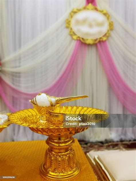 conch shell  golden tray  thai wedding wedding setup detail
