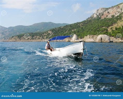 Man Driving A Boat Royalty Free Stock Photos Image 10588198