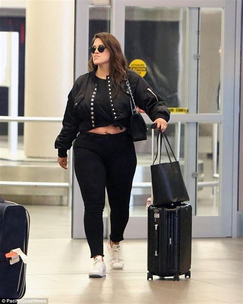 Ashley Graham Flashes Some Serious Leg Thanks To A Thigh High Slit