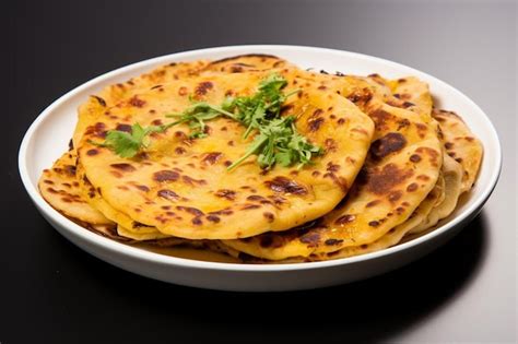 Premium Photo Crunchy Aloo Paratha Goodness On White Background The