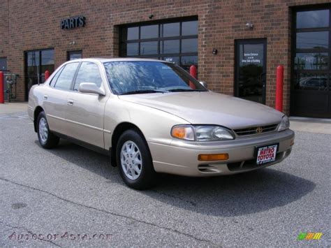 Toyota Camry Le Sedan In Cashmere Beige Metallic Photo