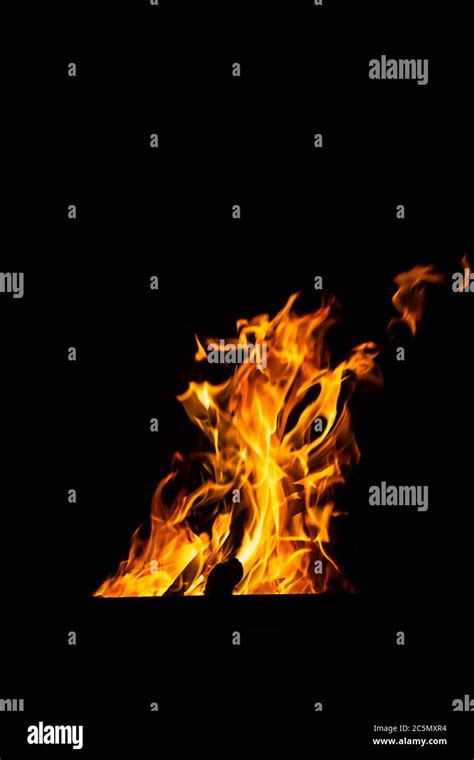 Danger fire on a dark background. Background from fire. Fire pattern can be used in design Stock ...