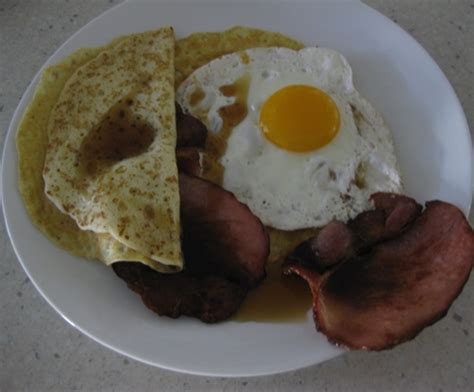 Breakfast Pancakes With Bacon Egg And Maple Syrup