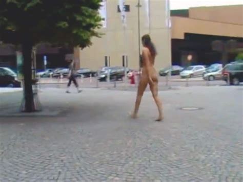 Naked Woman Walks Around City Streets On A Public Nudity Dare