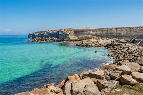 Tarifa SPAIN 5 August 2022 Rocks And Turquoise Bay On Beach And