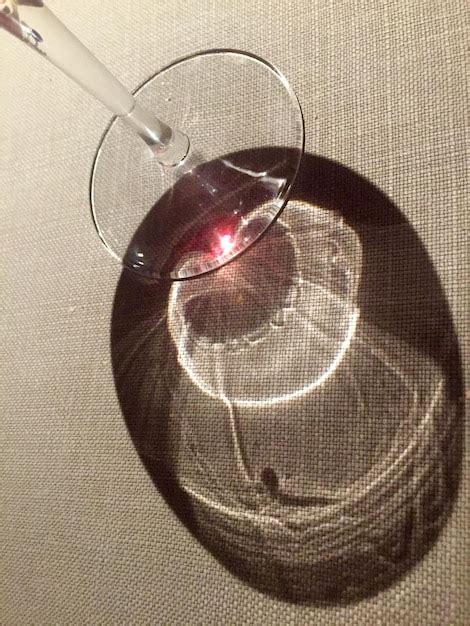 Premium Photo Shadow Of Wineglass On Table