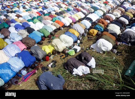 Muslims Perform An Eid Al Fitr Prayer In An Outdoor Open Area In Lagos