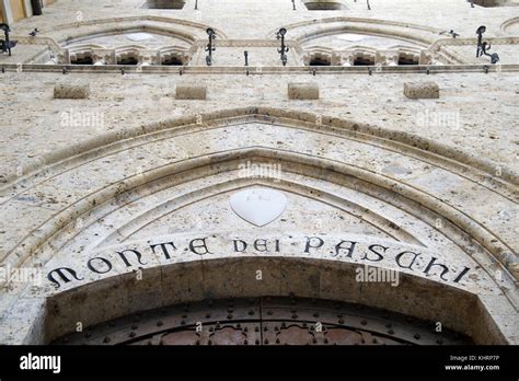 Main Entrance To Gothic Palazzo Salimbeni Headquarters Of Banca Monte