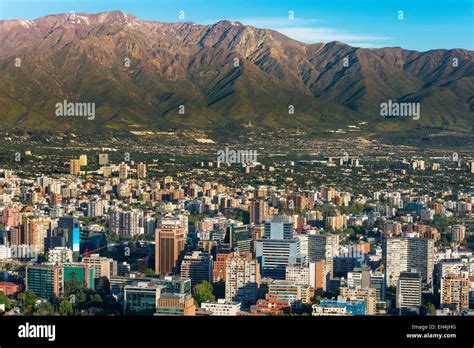 Panoramic View Of Santiago De Chile And Los Andes Mountain Range Stock