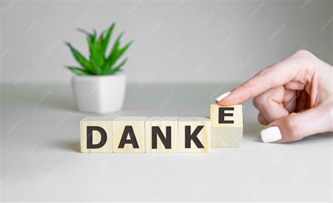 premium photo danke words  wooden cubes