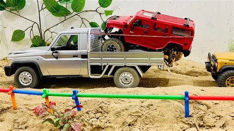 Rc Cars Toyota Land Cruiser And Remote Control Land Rover Defender 110 And Hummer H2 Flat Tire