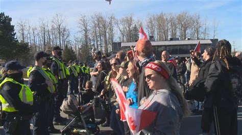 Police, protesters continue to face off at B.C. border crossing with concrete barriers in place ...