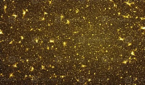 Gold glitter, gold particles star on black background. 13869544 Stock ...