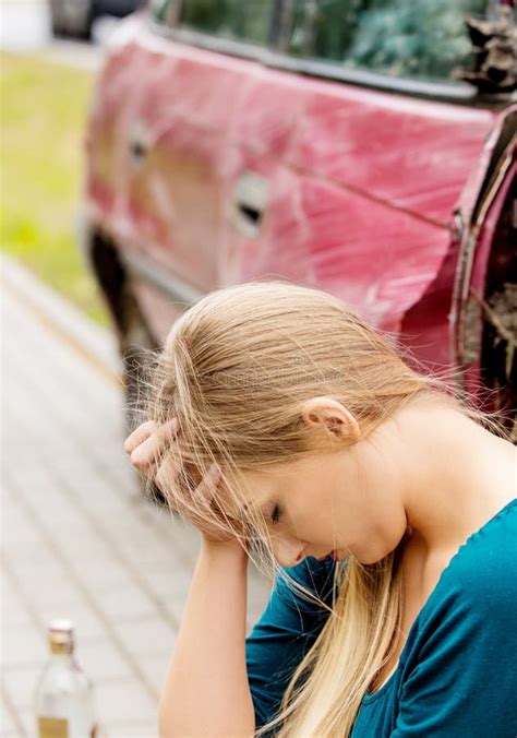 Upset Driver Woman In Front Of Automobile Crash Car Stock Image